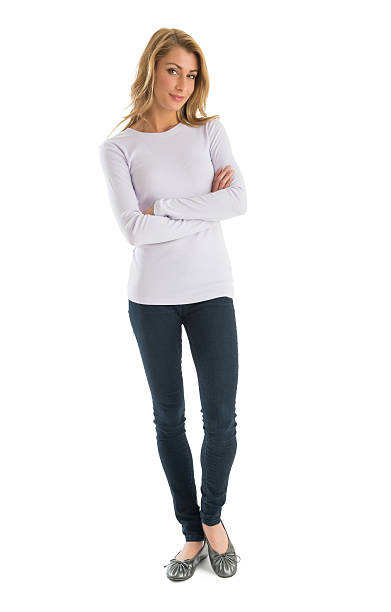 Confident Woman In Casuals Standing Arms Crossed stock photo
