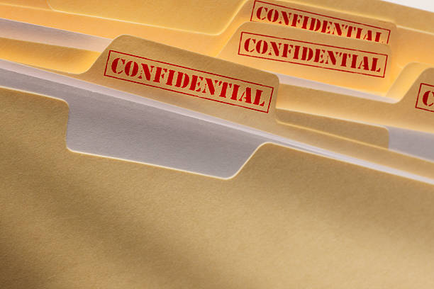 Confidential Files A stack of confidential files. top secret stock pictures, royalty-free photos & images