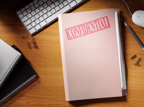 Confidential Folder on a Desk Confidential folder on a desk in the office. Copy spaceClick on the links below to see more of my stationary and finance images. top secret stock pictures, royalty-free photos & images