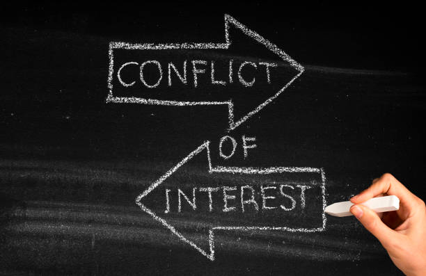 Conflict Of Interest Conflict Of Interest  concept on blackboard interest rate stock pictures, royalty-free photos & images