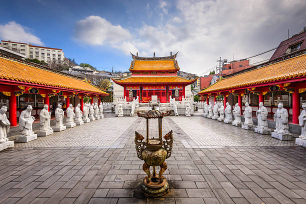 Confucius Shrine in Nagasaki Nagasaki, Japan - December 9, 2012: Statues representing the followers of Confucius line the courtyard of Confucius Shrine. Founded in 1893, it is considered the only Confucius shrine built outside of China by ethnic Chinese. nagasaki prefecture stock pictures, royalty-free photos & images