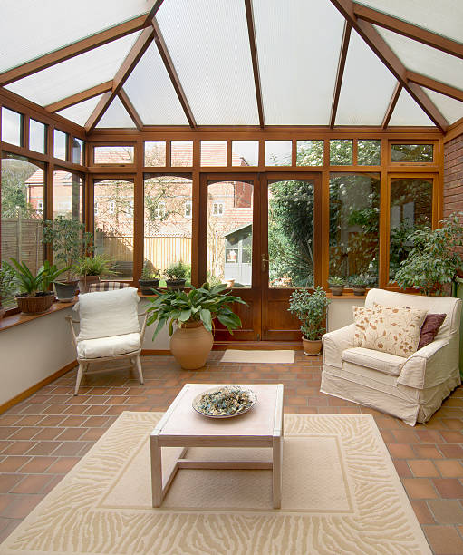 conservatory conservatory tables chairs plants room in house next to garden greenhouse table stock pictures, royalty-free photos & images