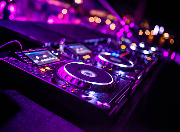 DJ console desk at nightclub DJ console desk at nightclub club dj stock pictures, royalty-free photos & images