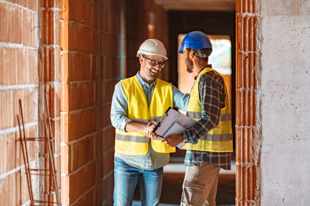Constriction Worker Shaking Hand of Contractor stock photo