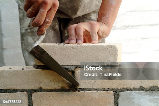 istock Construction masonary worker. 1267578222