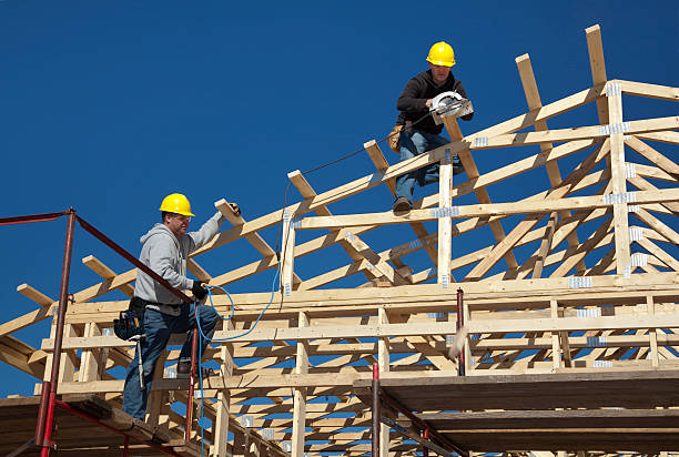 Construction Men Framing New Building Construction Men Framing New Building gable stock pictures, royalty-free photos & images