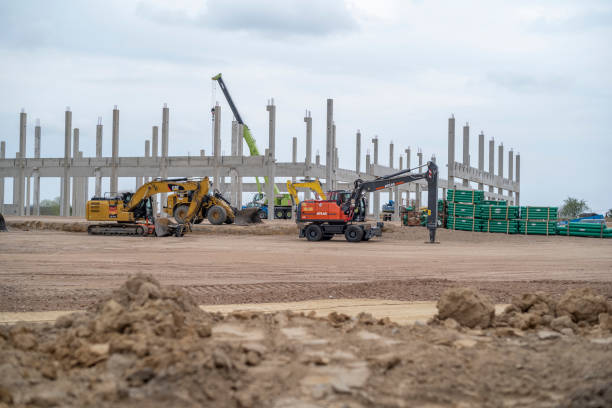 Construction site with Concrete pillar heavy duty crane construction machinery stock photo