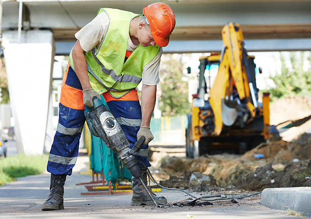 construction worker with perforator stock photo