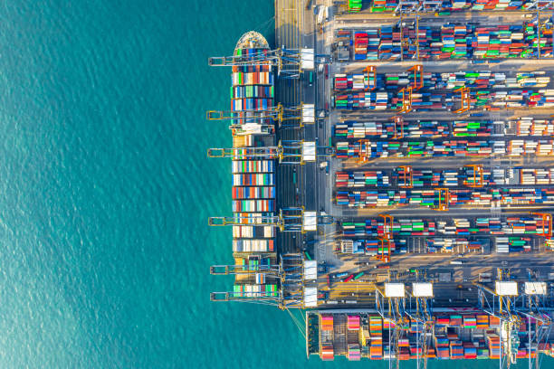 container cargo freight ship terminal in hong kong - aerial container ship imagens e fotografias de stock