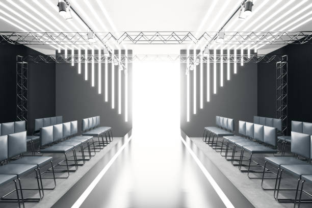 Contemporary empty fashion runway Contemporary empty fashion runway podium stage interior with seats, lights and copyspace. 3D Rendering fashion runway stock pictures, royalty-free photos & images