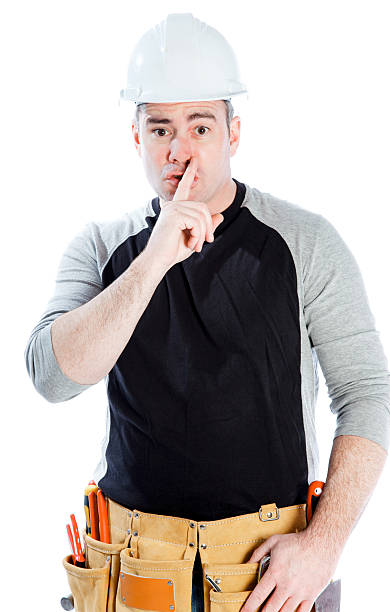 Contractor posing in a studio shot on a white background