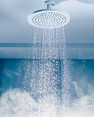 istock contrast shower with flowing water stream and hot steam 1290412269