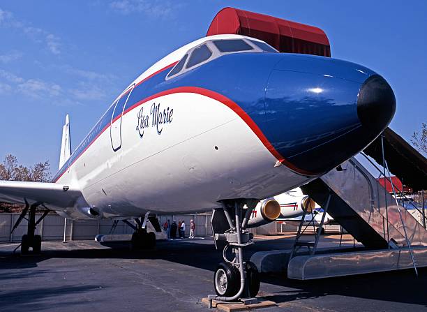 Convair CV880 aeroplane, Memphis. Memphis, United States - November 21, 1995: Convair CV880 named the Lisa Marie, Elvis Presleys private jet, with tourists to the rear, Memphis, Tennessee, United States of America. graceland stock pictures, royalty-free photos & images