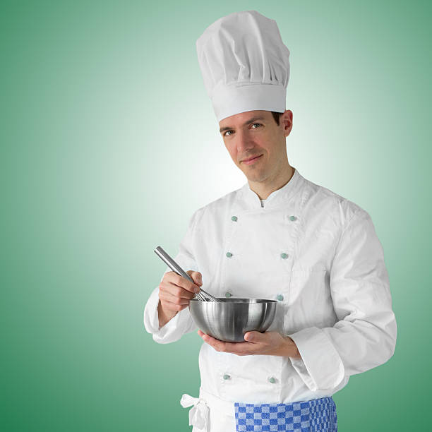 Cook Preparing Some Food For Dinner Stock Photo