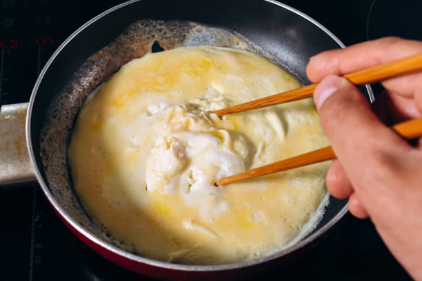 Cooking Tornado Omelette is a Korean dish. selective focus stock photo
