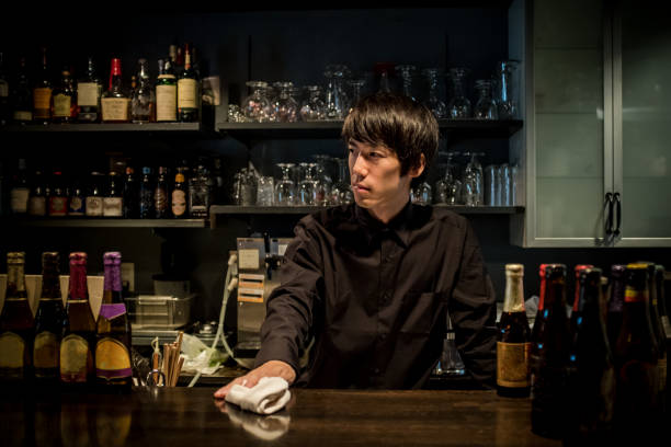 Cool bartender Cool bartender. bar drink establishment stock pictures, royalty-free photos & images