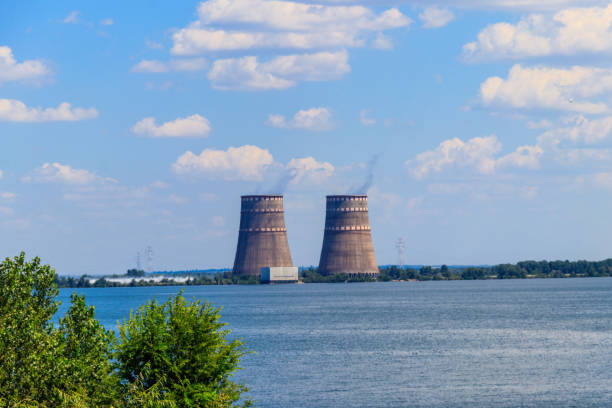 Cooling towers of Zaporizhia Nuclear Power Station in Enerhodar, Ukraine Cooling towers of Zaporizhia Nuclear Power Station in Enerhodar, Ukraine zaporizhzhia stock pictures, royalty-free photos & images