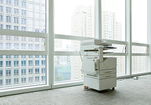 Copier on floor of high rise building professional copier in office building. xerox photocopy machine stock pictures, royalty-free photos & images