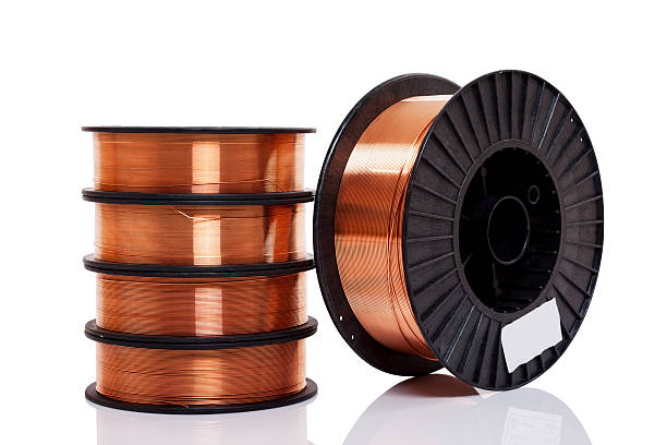 Copper alloy welding wire on spools stock photo