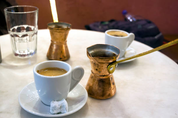 Copper coffee pots and greek coffe, sweet loukoumi on the small dish. Taken in Athens stock photo