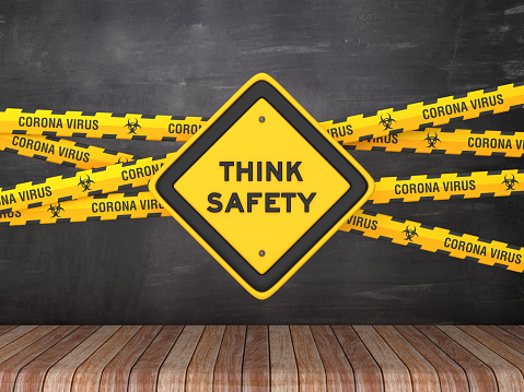 Cordon Tape with THINK SAFETY Road Sign on Chalkboard Background - 3D Rendering