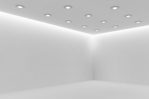 Corner Of Mpty White Room With Small Round Ceiling Lamps Stock