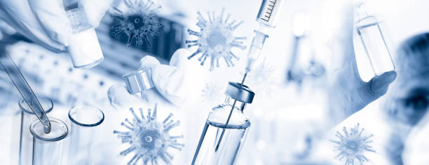 Corona virus and research Researchers with viruses, syringe and microscope and many other laboratory utensils vaccination stock pictures, royalty-free photos & images