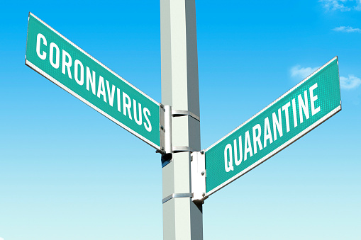 road signs quoting ”Coronavirus and quarantine”
