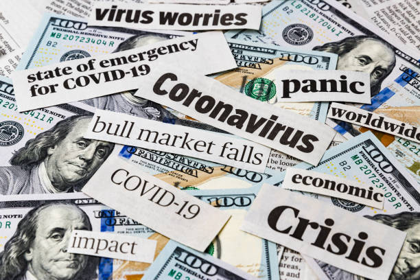 Coronavirus, covid-19 news headlines on United States of America 100 dollar bills. Concept of financial impact, stock market decline and crash due to worldwide pandemic closeup, background stock market and exchange photos stock pictures, royalty-free photos & images