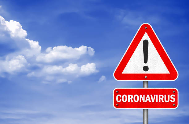 coronavirus - verkeersbord informatiebericht - gevaar stockfoto's en -beelden