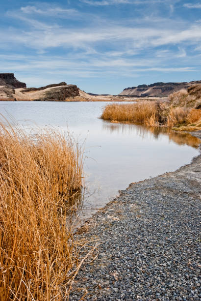 Corral Lake in the Central Washington Potholes There are many pothole lakes and ponds in the scablands of Central Washington. Corral Lake is in the Columbia National Wildlife Refuge near Othello, Washington State, USA. jeff goulden landscape stock pictures, royalty-free photos & images