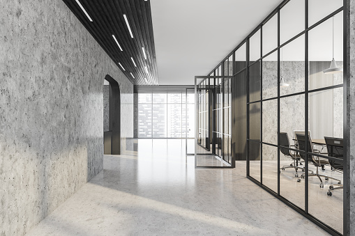 Office hall corridor and marble room with black armchairs and wooden table. Office minimalist interior behind glass doors, side view, 3D rendering no people
