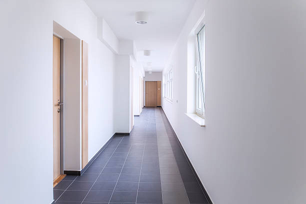 Corridor in the new apartment building Corridor in the new apartment building apartment corridor stock pictures, royalty-free photos & images