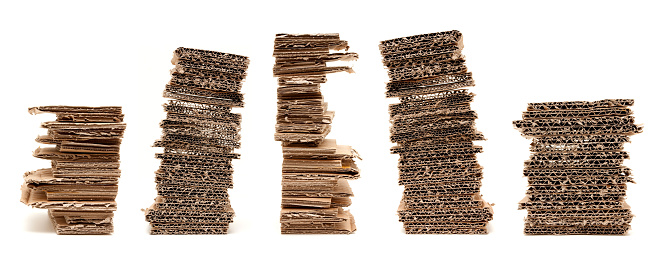 Corrugated stacked cardboard isolated on white background.