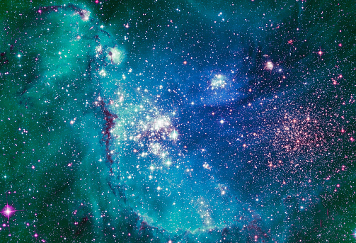 Night sky with clouds stars nebula background. Elements of this image furnished by NASA.