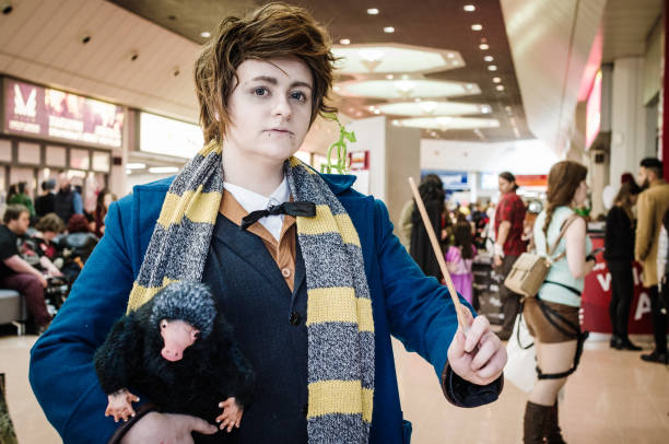 Cosplayer dressed as Newt Scamander. stock photo