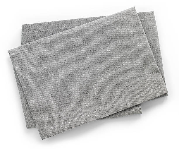Cotton napkin Folded grey cotton napkin isolated on white background top view folded photos stock pictures, royalty-free photos & images
