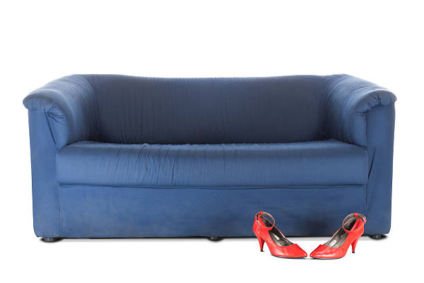 Couch and red shoes | Isolated stock photo
