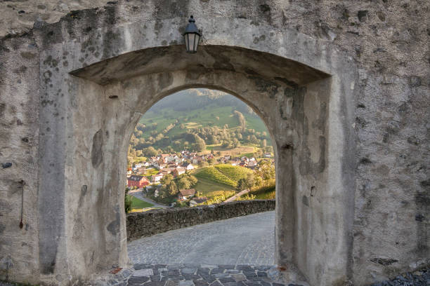 Countryside view through the stone window. Balzers, Liechtenstein stock photo