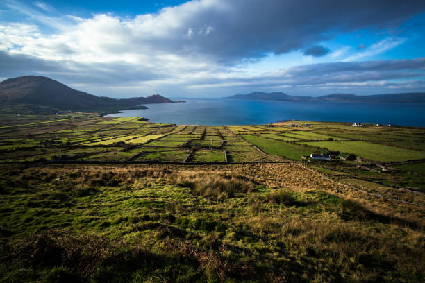 County Kerry landscape Green fields and the sea in County Kerry. county kerry stock pictures, royalty-free photos & images