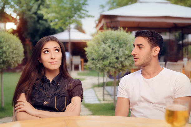 couple arguing on a date at a restaurant - boring date bildbanksfoton och bilder