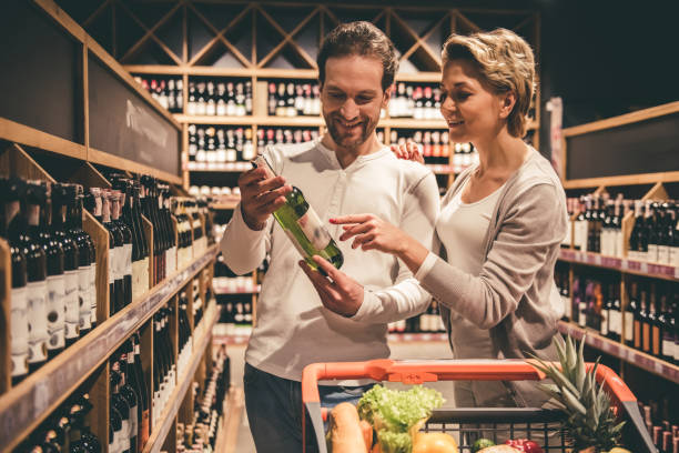 Couple at the supermarket stock photo