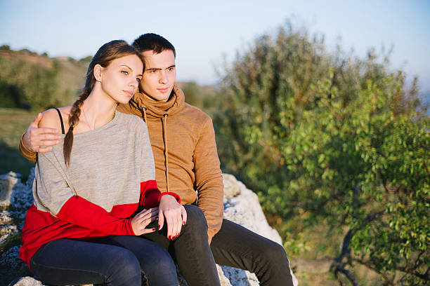 Couple Enjoying Romantic, lovers looking into the distance stock photo