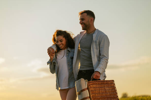 Couple going to picnic stock photo