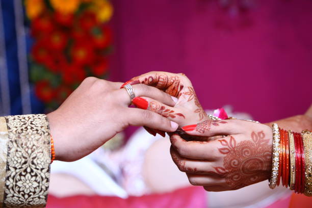 couple-hands-closeup-with-henna-art-picture-id1356364643