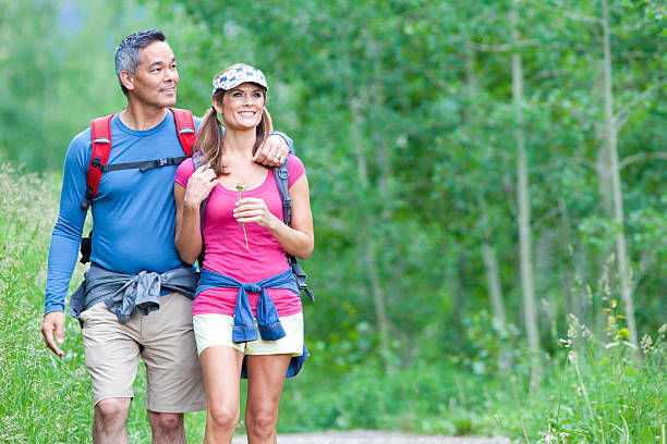 Healthy Older Couple Hiking Stock Photos, Pictures & Royalty-Free