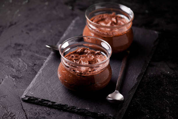 Couple Of Pots Of Homemade Chocolate Mousse stock photo