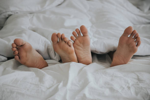Couple on the bed. Love and relationships stock photo stock photo