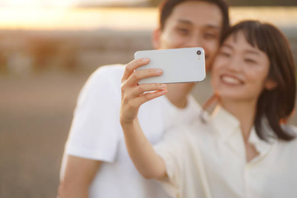 Couple taking a selfie stock photo
