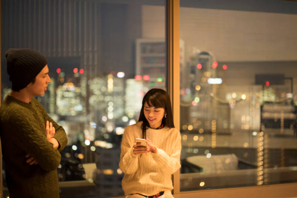 A couple who talks on good terms in the lounge Dating shy japanese woman stock pictures, royalty-free photos & images